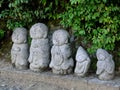 Close up of the little Nagomi Jizo statues located outside the Arashiyama Bamboo Forest, Kyoto Royalty Free Stock Photo