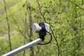 Close-up LNB placed on a satellite antenna installed on the home. LNB is used to amplify the received signal Royalty Free Stock Photo