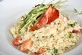 Close up of lobster risotto in a white bowl Royalty Free Stock Photo