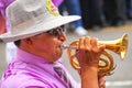 Close up of a local man playing trumpet during Festival of the V