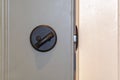 Close up of locked deadbolt latch on home door