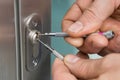 Lockpicker Fixing Door Handle At Home Royalty Free Stock Photo