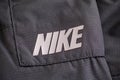 Close-up of logo Nike on black sweatpants