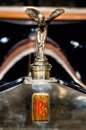 Close-up of the logo of Rolls Royce on the hood of a car Royalty Free Stock Photo