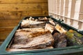 Close up of logs and wood stored in a log box Royalty Free Stock Photo