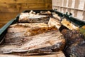 Close up of logs and wood stored in a log box Royalty Free Stock Photo