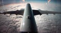 Close-up of a long-haul airliner in flight above the clouds Royalty Free Stock Photo