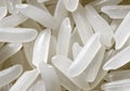 Close up of long rice. Macro of white rice grains can use for background and texture. Pile of natural rice realistic closeup photo