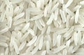 Close up of long rice. Macro of white rice grains can use for background and texture. Pile of natural rice realistic closeup photo