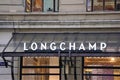 Close up Longchamp storefront brand name in white letters
