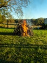 Fire for wiener roast in pasture