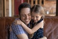 Close up loving father and daughter hugging, enjoying tender moment Royalty Free Stock Photo