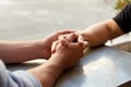 Close Up Of Loving Male Gay Couple Sitting At Table In Coffee Shop Holding Hands Royalty Free Stock Photo