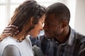 Close up of loving black couple hug looking in eyes Royalty Free Stock Photo