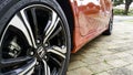 Close-up low angle view of the back wheel of a 10th Generation Honda Civic Royalty Free Stock Photo