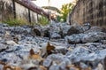 Close-up low-angle view of rubble heaps of broken concrete roads