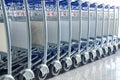 Close up of luggage carts at modern airport Royalty Free Stock Photo