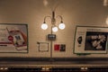 Close-up of luminaires in the Cite subway station platform in Paris.