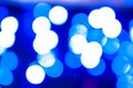 Luminous and defocused blue lights on dark background with bokeh effect for wallpaper Royalty Free Stock Photo