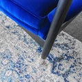 Close-up of a luxurious blue velvet armchair