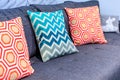 Luxury cozy couch close up with decorative pillows in geometric