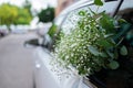 Close up of luxury wedding car flowers decoration. Royalty Free Stock Photo
