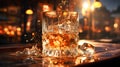 Close up of luxury whiskey pouring into elegant wineglass