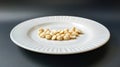 Closeup of macadamia nuts on a white plate Royalty Free Stock Photo