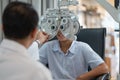 Close up machine that use to measure eyesight and for eye care of children in optical shop and control by staff or ophthalmologist Royalty Free Stock Photo