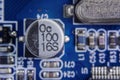 Close up macro of aluminum electrolytic capacitors installed on