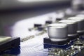 Close up macro of aluminum electrolytic capacitors installed on Royalty Free Stock Photo