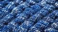 Close-up Macro of Blue Knitted Fabric with White Flecks Royalty Free Stock Photo