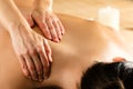 Detail of hands massaging female back. Royalty Free Stock Photo