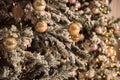 Close up, macro. Festive christmas background.A richly decorated Christmas tree, strewn with golden balls and lights of garlands