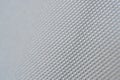 Close up macro pattern of knitt fiber fabric syntetic modern furniture material weave grey background