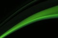 A close up macro photo of a diagonal wisp of green smoke on a black background that makes an abstract artistic retro background Royalty Free Stock Photo