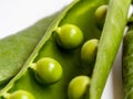 close up macro photo of fresh tasty peas in a pod