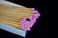 Close-up macro of pink wood stick matches in a box Royalty Free Stock Photo