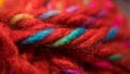 Close up macro shot of a ball of red wool