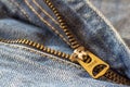 Close up macro shot details of denim blue jeans zipper, selective focus, jeans fashion background concept Royalty Free Stock Photo
