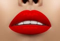 Close-up macro shot of female mouth. Glamour red lips Makeup with sensuality gesture. Bloody lipstick Royalty Free Stock Photo