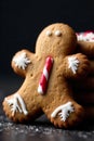 Close up Macro Shot of a Gingerbread Christmas Cookie with Detailed Icing Patterns and a Single Candy Cane. Extreme close up macro Royalty Free Stock Photo