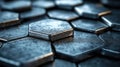 A Close-Up Macro Shot of Hexagonal Metal Tiles with a Textured, Gritty Surface and Sharp Edges Royalty Free Stock Photo