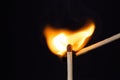 Close up Macro shot of a ignition match on a second match captured in super slow motion Royalty Free Stock Photo