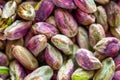 Close-up macro shot of roasted and shelled Australian pistachio nuts.