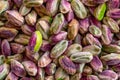 Close-up macro shot of roasted and shelled Australian pistachio nuts.