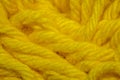 Close-up macro shots a yellow wool thread on the wool thread ball Royalty Free Stock Photo