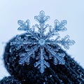 Close Up Macro Snowflake on Dark Knit Fabric Against a Soft Background Royalty Free Stock Photo