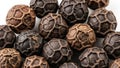 Close Up Macro View of Black Peppercorns Showing Textured Rind and Hexagonal Pattern Details Royalty Free Stock Photo