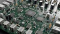 Close-up macro view of a complex electronic circuit board with microchips electronics technology Royalty Free Stock Photo